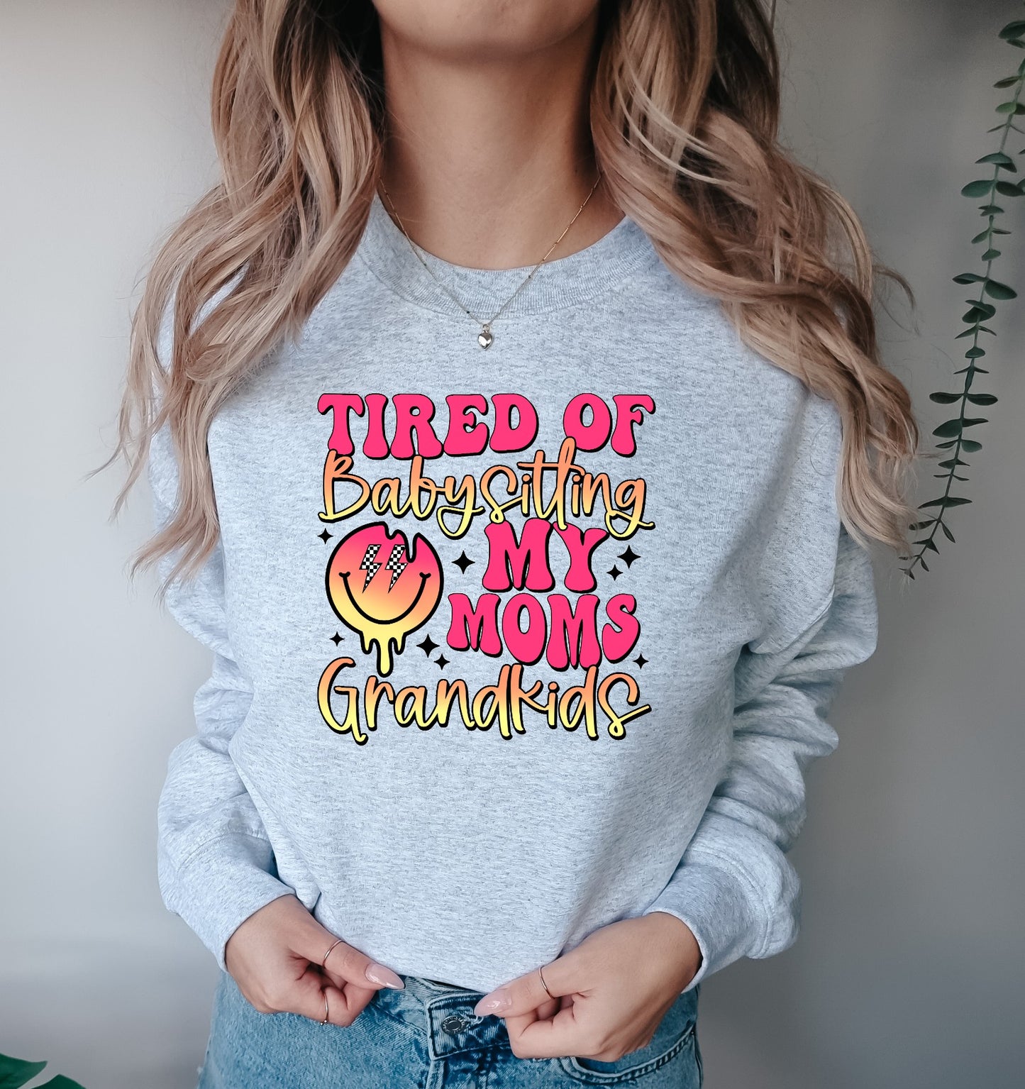 Tired Of Babysitting My Mom's Grandkids Graphic Sweatshirt